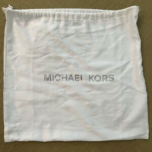 Michael Kors White Elegant and Versatile dust bag. 15 1/2”x 16”